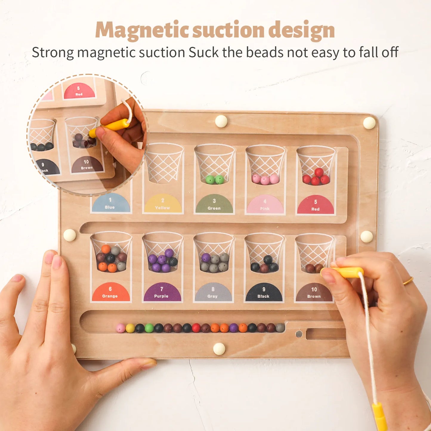 Close-up of magnetic suction design on the color & number maze — secure magnetic beads stay in place for safe, mess-free play, demo shot in USA