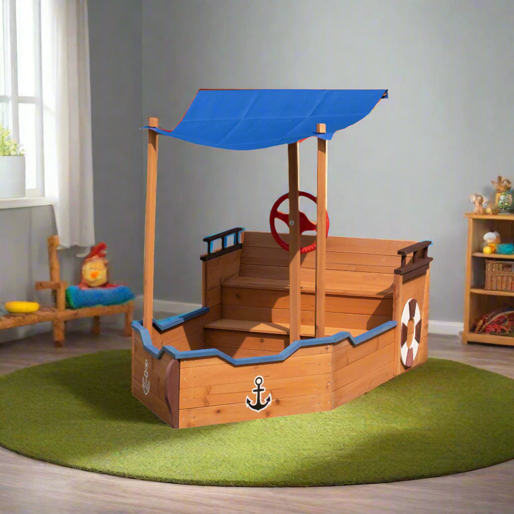 Indoor wooden sandbox partially filled with sand - functional play area