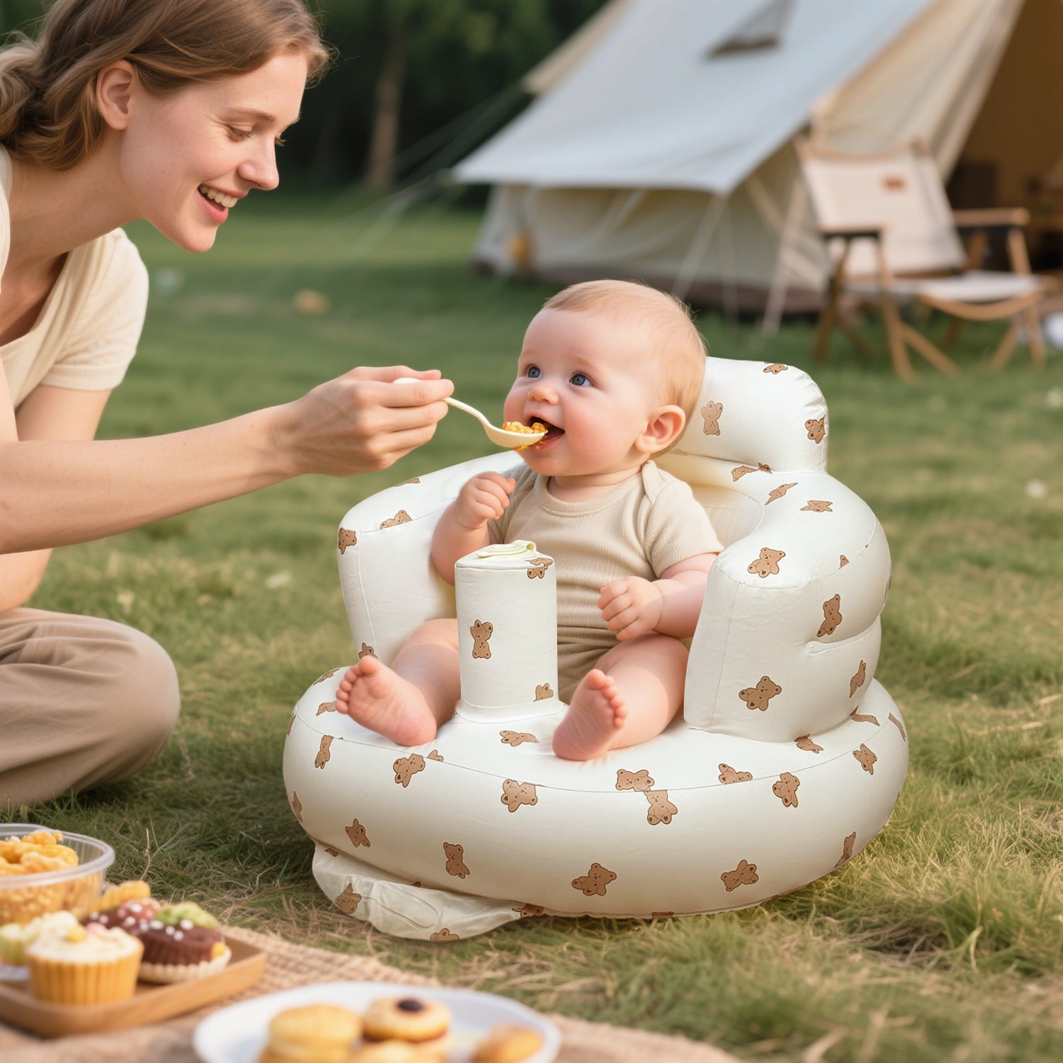 Mom feeds her little one in the ComfyBub™ portable inflatable baby seat - keeping them secure and comfortable outdoors