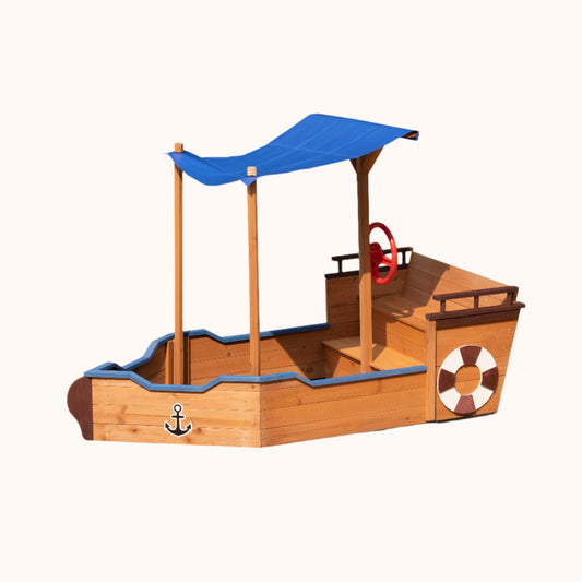 Outdoor wooden sandbox with built-in storage bench and seat - front view