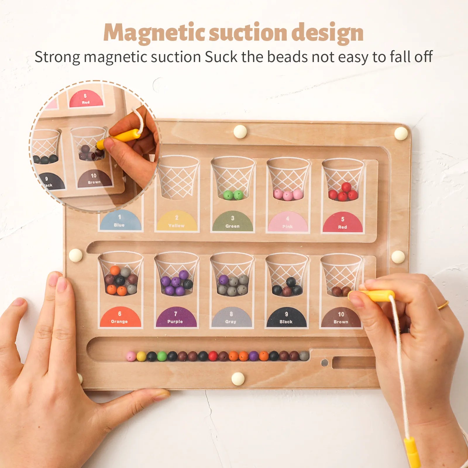 Close-up of magnetic suction design on the color & number maze — secure magnetic beads stay in place for safe, mess-free play, demo shot in USA